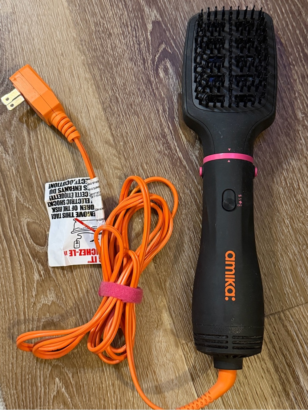 amika Black Styling Hot Brush with Pink Accent and Orange Logo